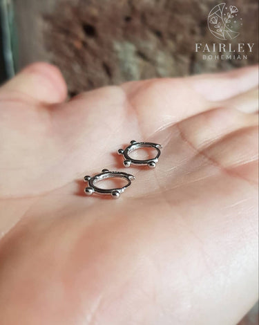 | Triple Ball Huggie Hoops |